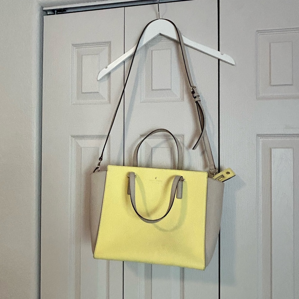 Kate Spade Cedar Street Hayden bag in a yellow and tan color-blocked design.